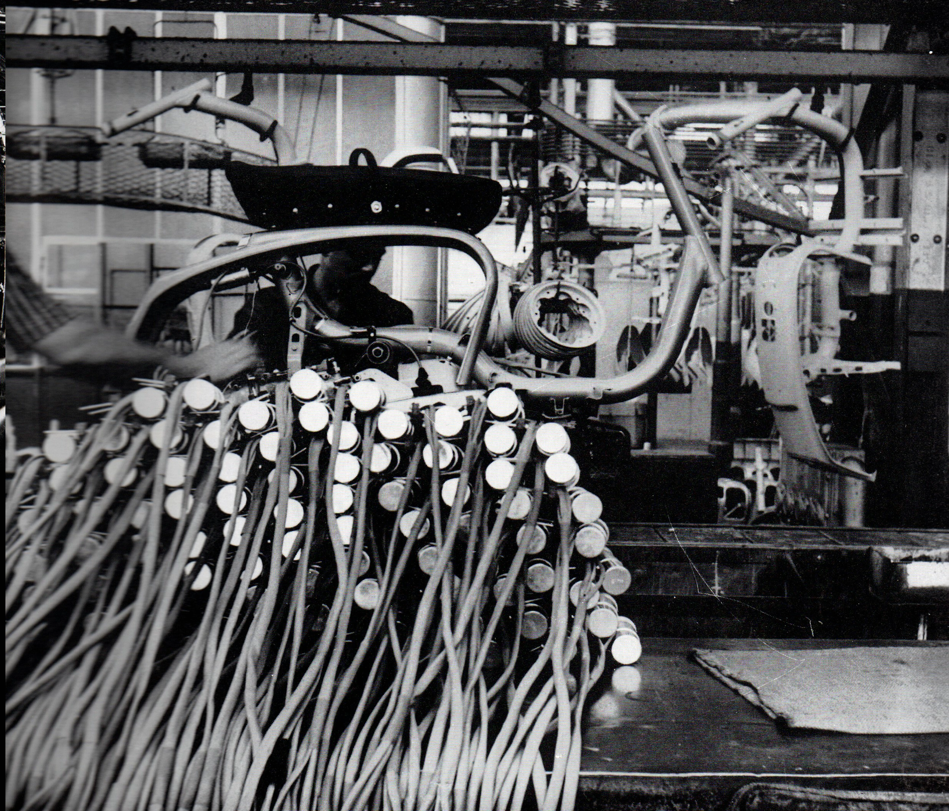 Lambretta wiring looms and electrical assemblies awaiting installation on the assembly line
